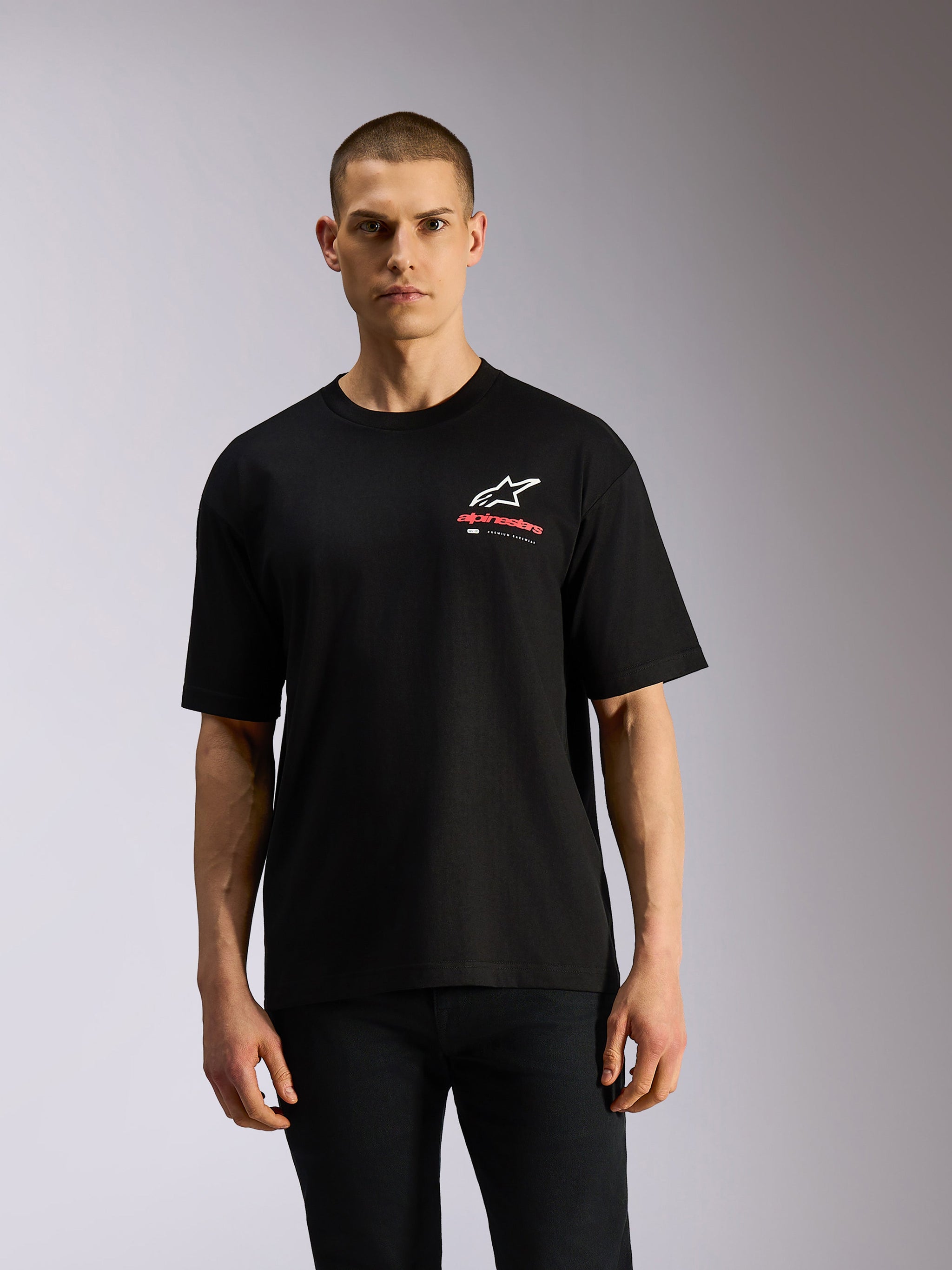 Alpinestars Overhang Oversized CSF Tee, Short Sleeve T-Shirt, Black, featuring a White Astars Logo and Red Alpinestars Wordmark on the chest, Casual Motorsport Streetwear
