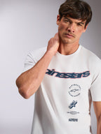 Alpinestars Abus CSF Tee, Short Sleeve T-Shirt, White, featuring navy Alpinestars curved logo with red outline and multi-stacked graphics, casual motorsport streetwear
