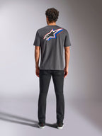 Alpinestars Angler CSF Tee, Short Sleeve T-Shirt, Charcoal, Large Multi-color Astars Logo on back with red and blue accents, rear view on model, casual motorsport streetwear