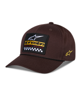 Alpinestars Matrix Snapback Hat, Brown, featuring a front embroidered patch with white logo, yellow branding, and checkered pattern, side Astars logo, curved bill, casual sportswear