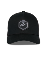 Alpinestars Hexeon Trucker Hat, Black casual sportswear cap, structured crown with curved bill, front hexagonal woven patch with Alpinestars logo and 1963, mesh back for breathability