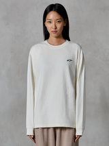 Alpinestars Essentials Ageless LS Tee, Long-Sleeve T-Shirt, Off White, featuring a small black star logo on the chest, relaxed contemporary fit, organic cotton jersey, casual motorsport-inspired streetwear