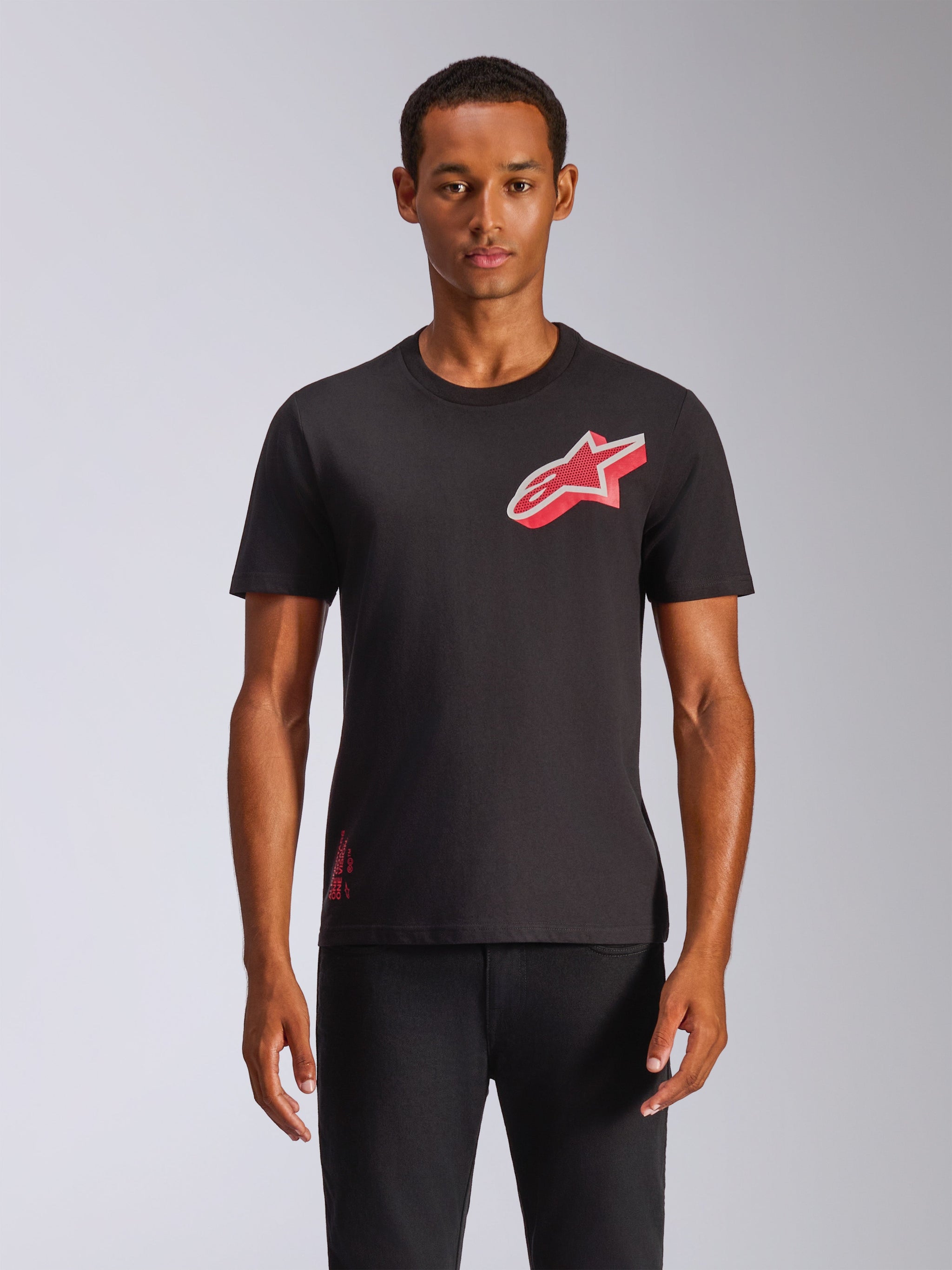Alpinestars Shaded CSF Tee, Short Sleeve T-Shirt, Black, Red Slanted Gradient Foil Astars Logo, Worn by Model with Black Pants, Casual Motorsport Streetwear