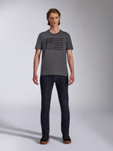 Alpinestars Waving CSF Tee, Short Sleeve T-Shirt, Charcoal Gray, Black Blaze 2.0 flag-style logo graphic, Casual Motorsport Streetwear, worn with dark denim jeans