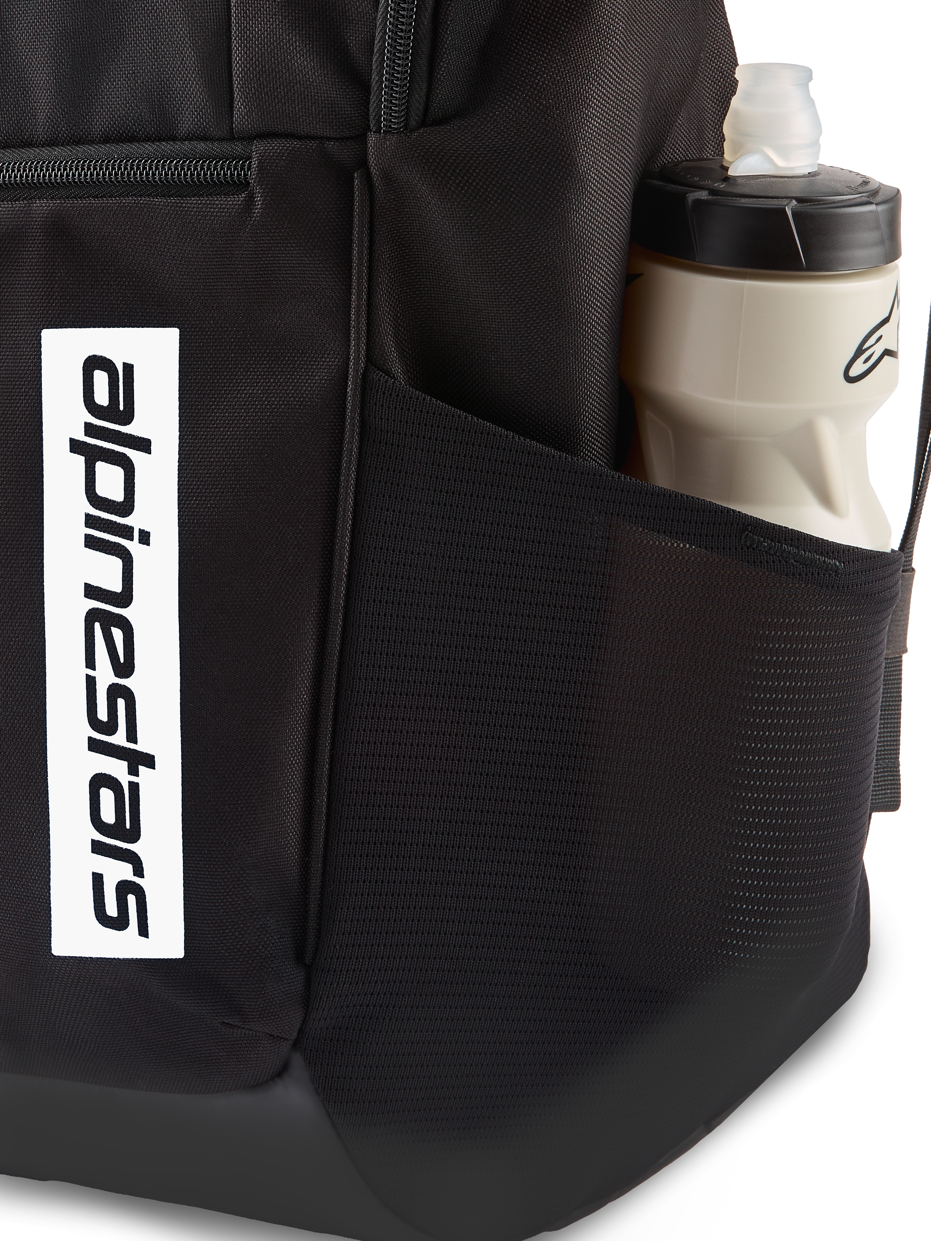 Alpinestars Defcon V3 Backpack, black daily backpack, close-up of side mesh pocket with water bottle, vertical white logo branding on front, durable 600D polyester material