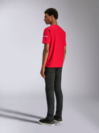Alpinestars Frontal CSF Tee, Short Sleeve T-Shirt, Red, back view on model, featuring white logo on the sleeve, paired with black pants, performance casual streetwear