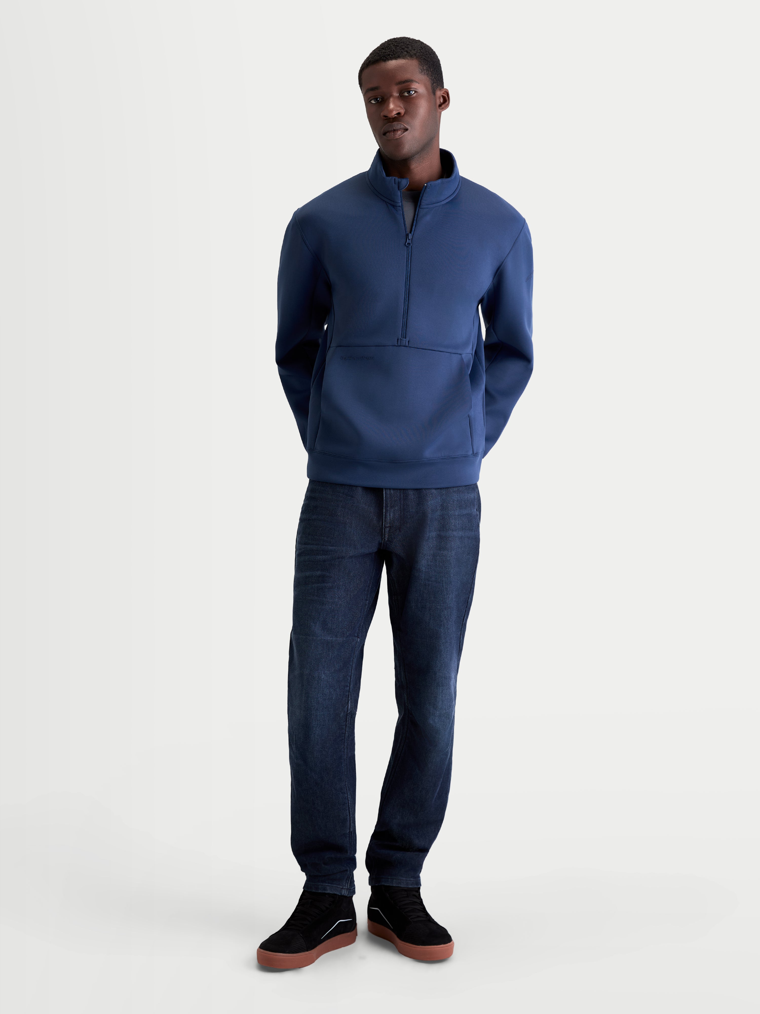 Alpinestars Apera Half-Zip Sweatshirt, Men's Sportswear Pullover, Steel Blue, featuring a half-zip front, high collar, and front kangaroo pocket, constructed from tri-blend double-face fleece for a premium feel and motorsport-inspired casual style.
