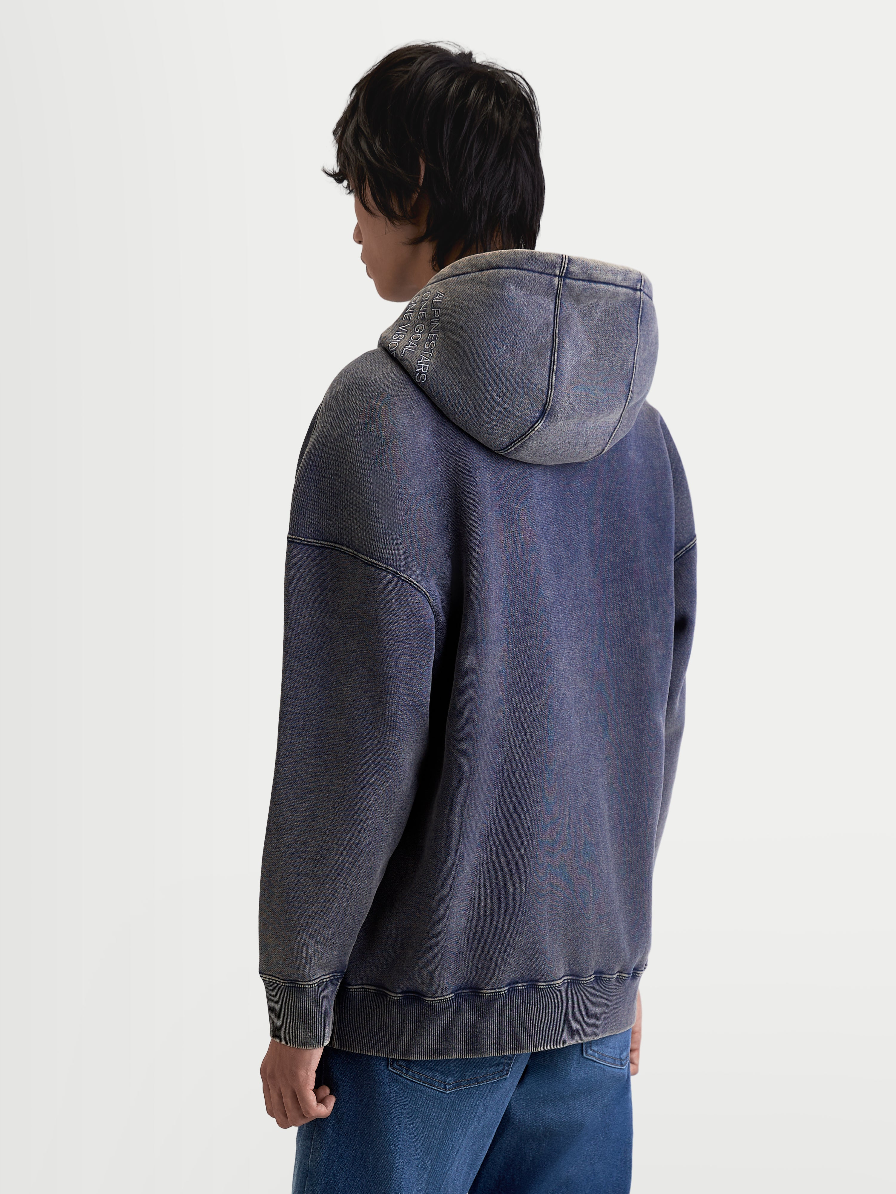 Alpinestars Infinite Washed Oversized Hoodie, Casual Sportswear Pullover, Unisex, Washed Navy Blue, Snow-Wash Finish, Premium Cotton-Blend Fleece, featuring Alpinestars Wordmark and One Goal One Vision Hood Embroidery, Relaxed Fit, Back View on Model.