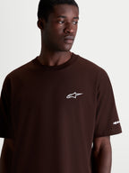 Alpinestars Mandate Oversized CSF Tee, Short Sleeve Casual Sportswear, Brown with White Astars Logo, Men's and Women's Relaxed Oversized Fit, Cotton-Poly Blend, On-Model Detail Shot.