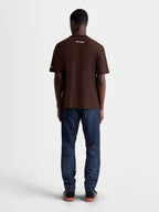 Alpinestars Mandate Oversized CSF Tee, Men's Short Sleeve Sportswear T-Shirt, Brown, Relaxed Oversized Fit, White Wordmark Logo on Back, Back View on Model