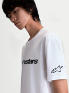 Alpinestars Race Wordmark CSF Tee, White and Black Casual Sportswear Short Sleeve T-Shirt, featuring a bold front wordmark and Ageless star logo on the sleeve, soft-hand graphic print, cotton-poly blend, on-model side view.
