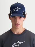 Alpinestars 500 Snapback Hat, Sportswear Baseball Cap for Men, Navy Blue and Black, featuring a curved bill and structured crown with a 3D embroidered Astars logo and white contrast piping, front view on model.