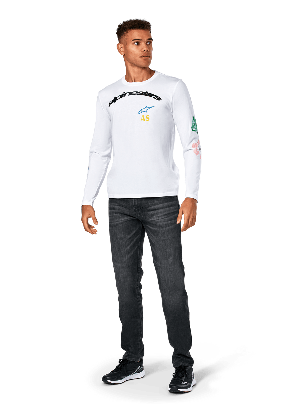 Alpinestars Brundo CSF Tee - Long Sleeve, White, casual sportswear, featuring black 'alpinestars' chest text, a blue star logo, and yellow 'AS' initials, colorful graphics on the sleeve, worn with dark jeans and black sneakers