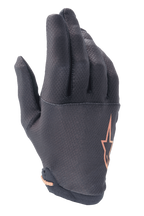 Alpinestars A-Aria Gloves, Mountain Bike (MTB) Gloves, Black with Rose Gold Star Logo, featuring a textured grid pattern on the fingers and lightweight stretch fabric for trail riding