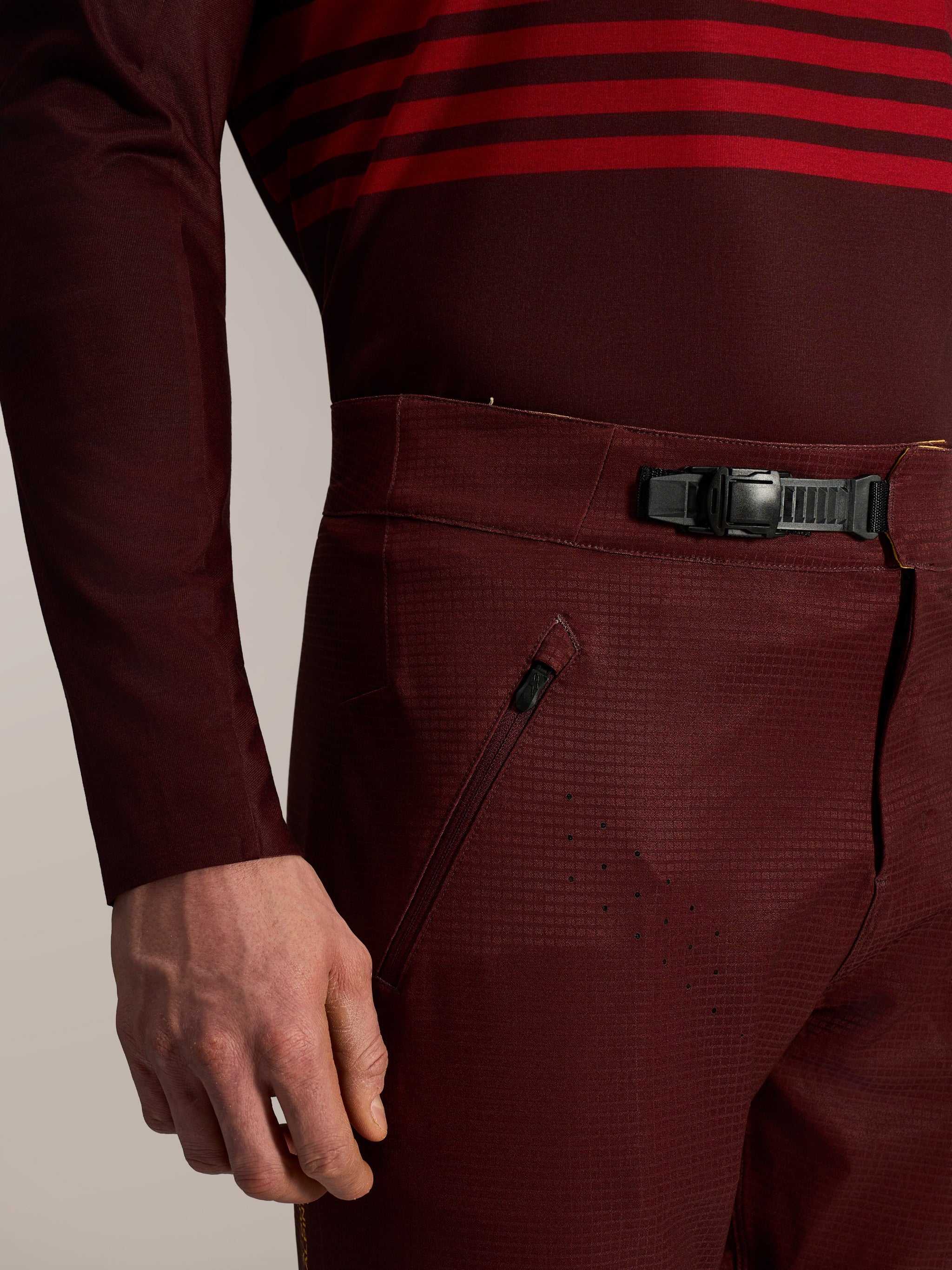 Alpinestars A-Dura Elite Flex Pants in Bordeaux featuring a ratchet closure, zippered pocket, and laser perforations.