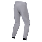 Alpinestars A-Dura Waterproof Pants, MTB Pants, Titanium Gray, Rear view, featuring tapered legs with black elasticated cuffs, minimalist technical design for mountain biking