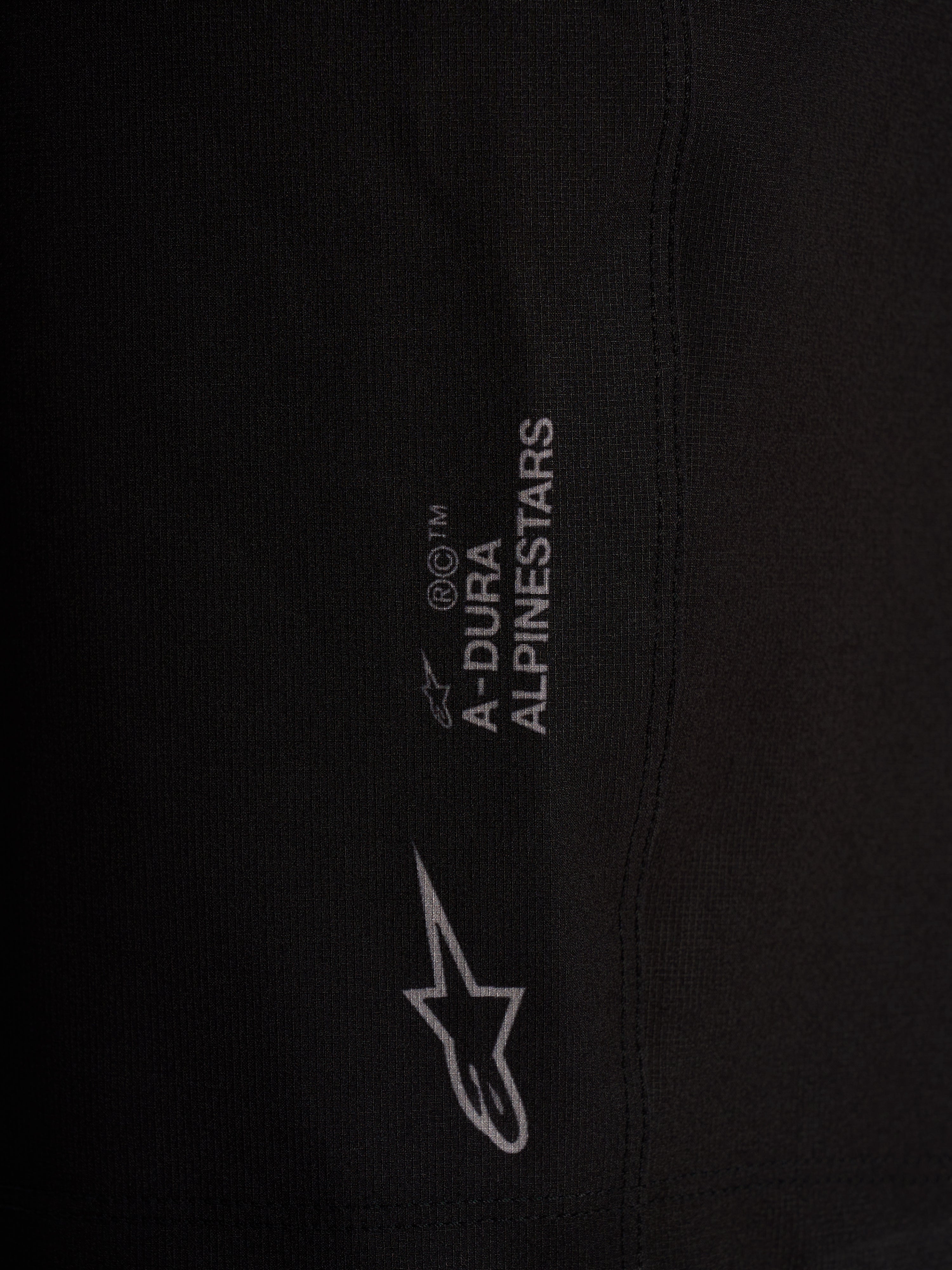 Black A-Dura Ride Liner Shorts featuring Alpinestars branding and logo detail on performance 4-way stretch fabric.