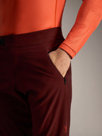 Alpinestars A-Dura Ride Shorts in Bordeaux, featuring a zippered side pocket and durable 4-way stretch MTB fabric.
