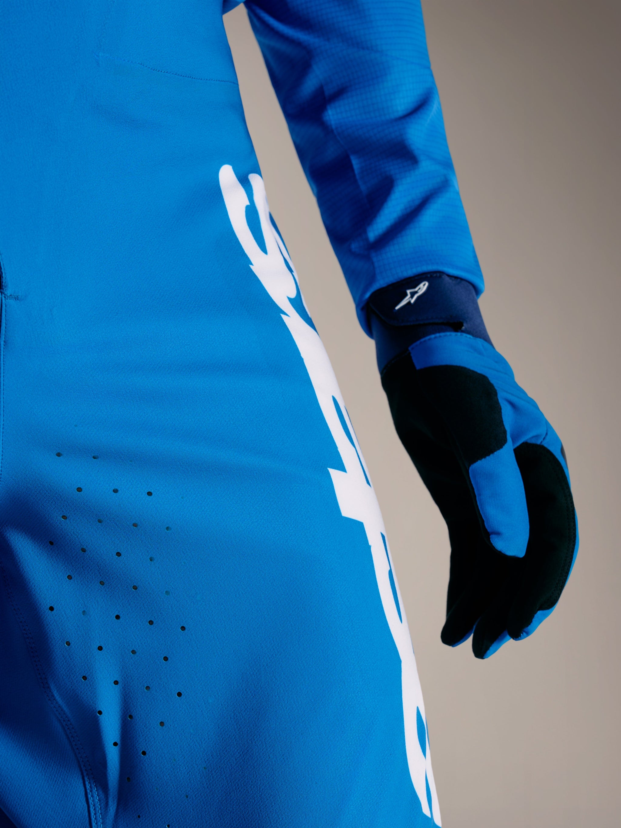 Faded Bright Blue A-Supra Elite Pants with laser-cut ventilation and white Astars wordmark on premium stretch fabric.