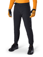 Alpinestars A-Dura Pants, Mountain Bike Pants, Black, side waist cinches and zippered pockets, worn with orange jersey and gloves, sporty regular fit for MTB riding