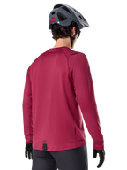 Alpinestars A-Dura Thermal Jersey, Long Sleeve Mountain Bike Jersey, Burgundy, back view on model wearing a grey MTB helmet and black gloves, featuring an extended drop tail and small logo details, designed for cold-weather trail riding.