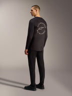 Black Alpinestars A-Dura Air Long Sleeve Jersey featuring a white circular Racing Ahead graphic on the back, MTB style.