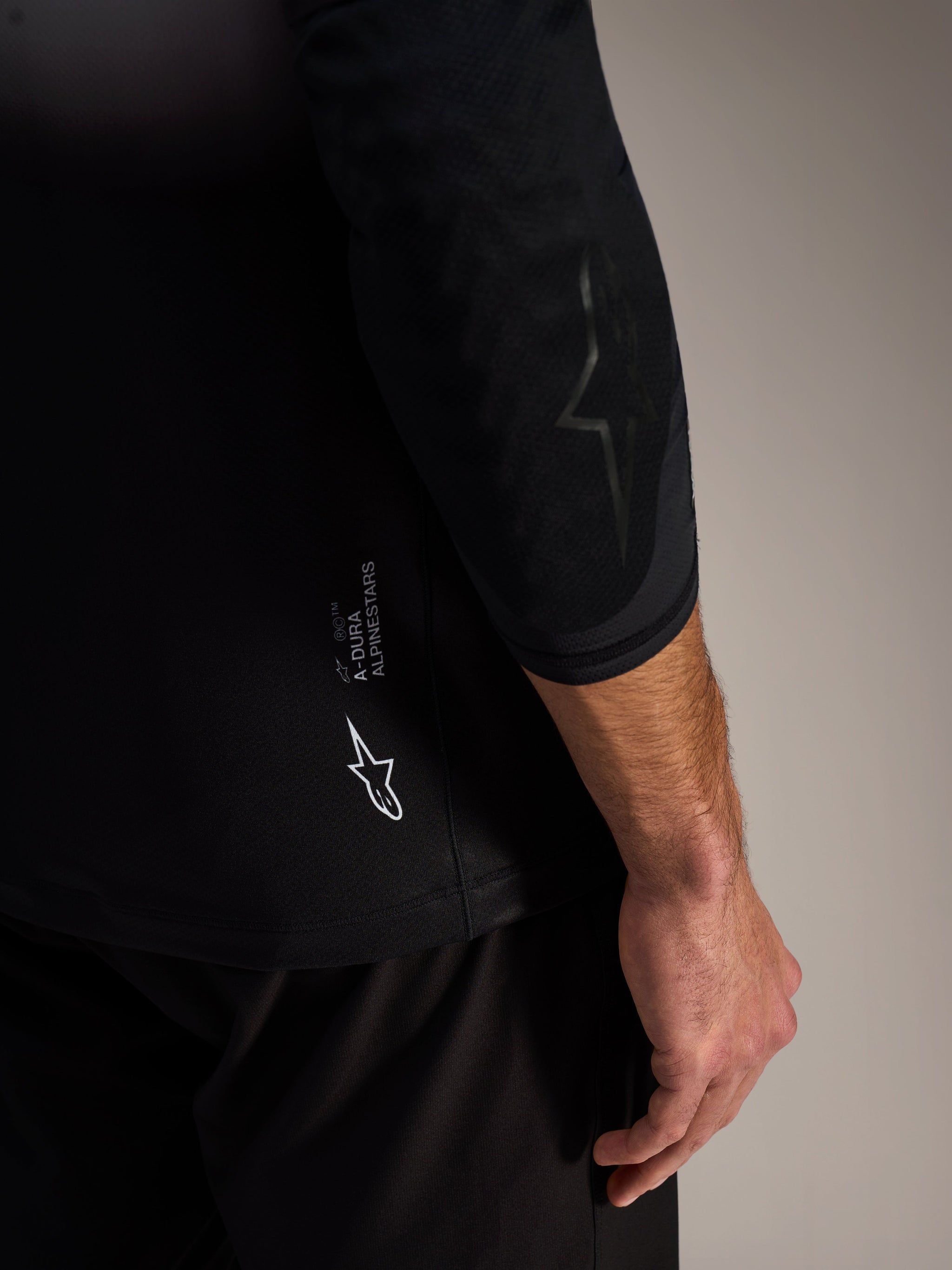 A-Dura Air Long Sleeve Jersey in gray, featuring technical moisture-wicking fabric and white Alpinestars branding.