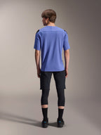Alpinestars A-Aria Polartec Elite Short Sleeve Jersey, Baja Blue, back view, worn by model with black mountain bike shorts and knee protection, performance cycling apparel