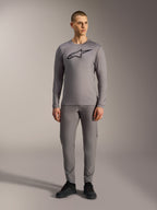 Alpinestars A-Dura Ride Long Sleeve Jersey in Gray, featuring a large black chest logo, worn with matching MTB pants.