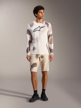 A-Dura Ride Long Sleeve Jersey in sand camo, performance MTB apparel featuring a large black Astars logo on the chest.