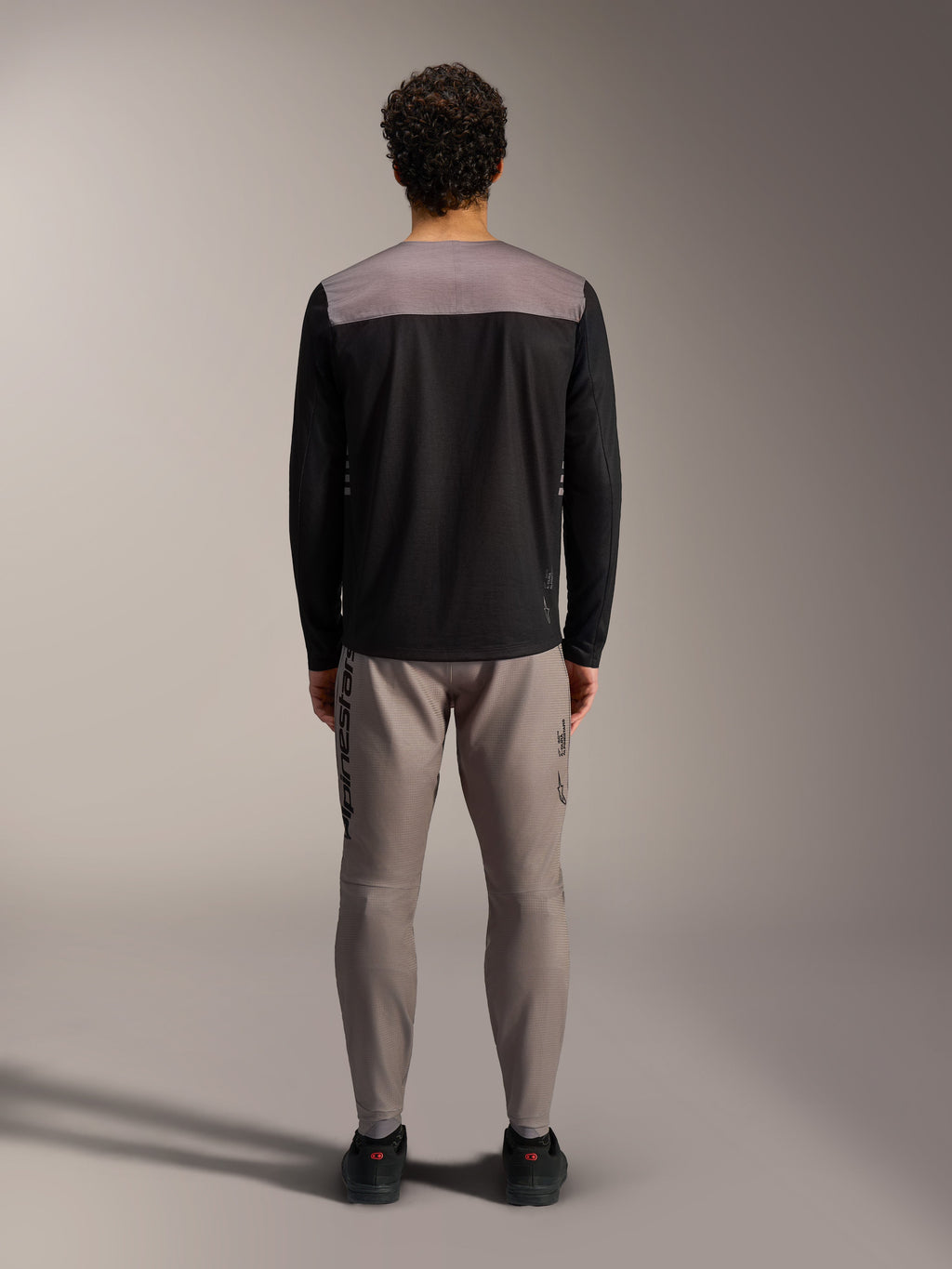 Alpinestars A-Dura Elite 2.0 Long Sleeve Jersey in black and grey, versatile MTB trail riding gear, back view.