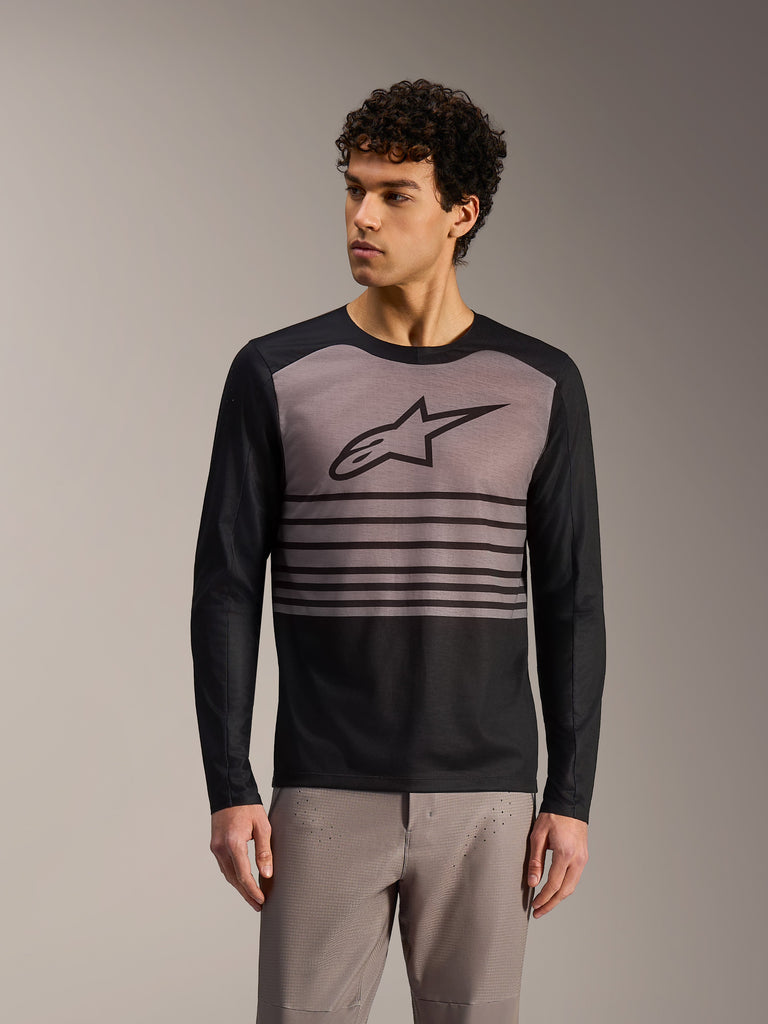 Alpinestars A-Dura Elite Jersey 2.0, long-sleeve MTB top in black and grey color-block design with bold chest logo.