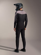 Alpinestars A-Supra Elite MTB kit in black and grey, featuring a performance jersey and matching racing pants from the back.