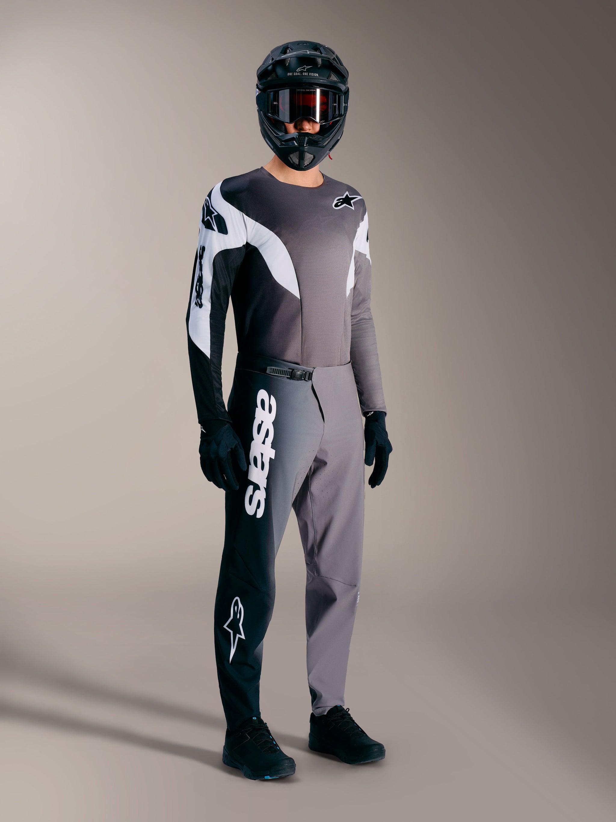 A-Supra Elite MTB racing kit in Faded Gray, featuring performance pants with a bold white wordmark and matching jersey.