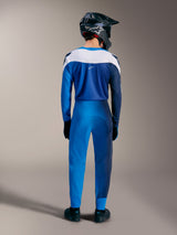 A-Supra Elite MTB kit in Faded Bright Blue, back view of gradient jersey and performance pants with white paneling.