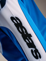 A-Supra Elite Jersey in Faded Bright Blue, close-up of black ASTARS logo on white panel and technical textured fabric.