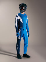A-Supra Elite Jersey in Faded Bright Blue, worn as a complete MTB kit with matching performance pants and full-face helmet.