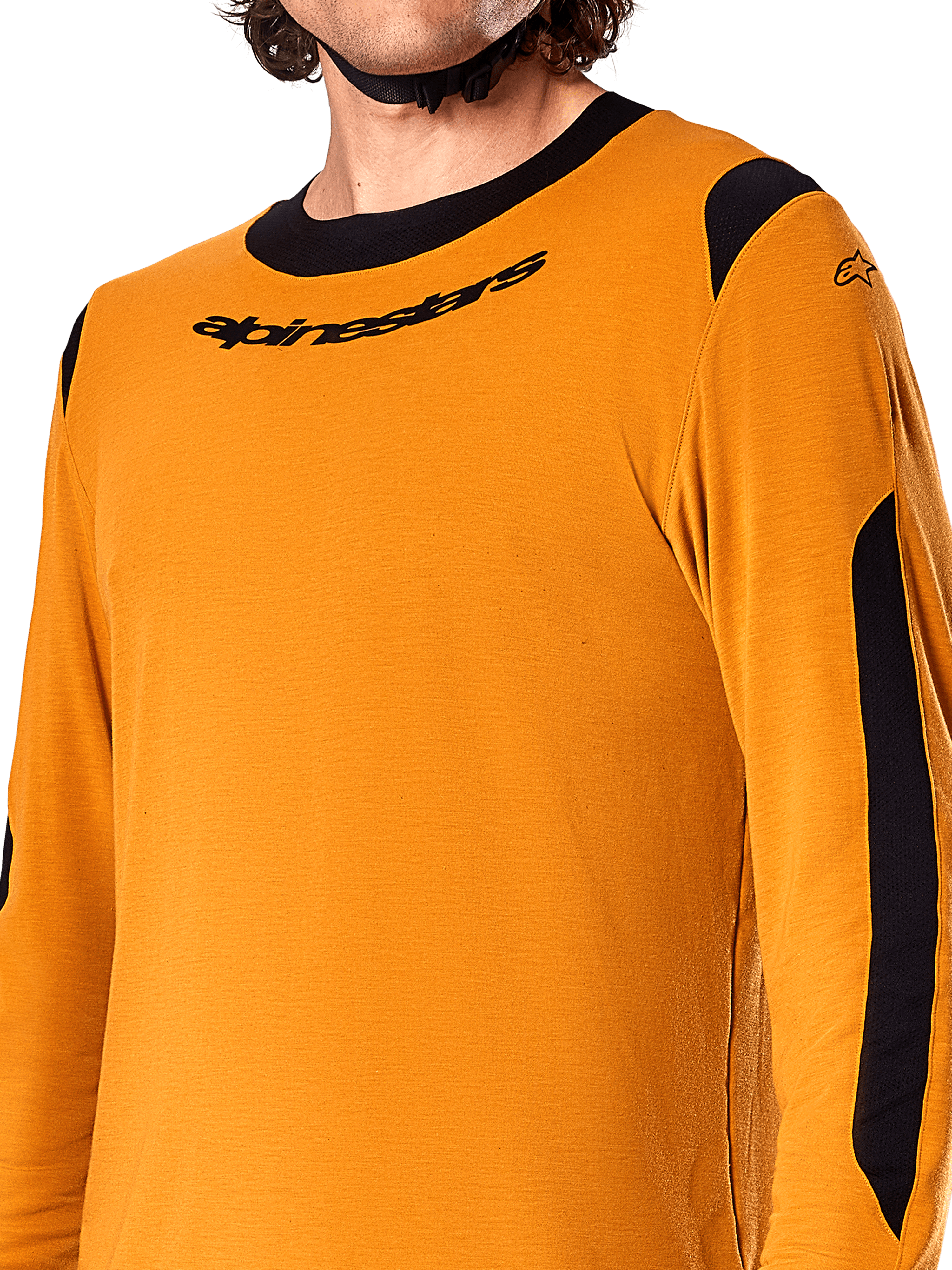 Alpinestars A-Dura Dri Wool Long Sleeve Jersey, Dark Gold, close-up showing black crew-neck collar with logo and black mesh ventilation panels on the shoulders and arms, high-performance mountain bike apparel