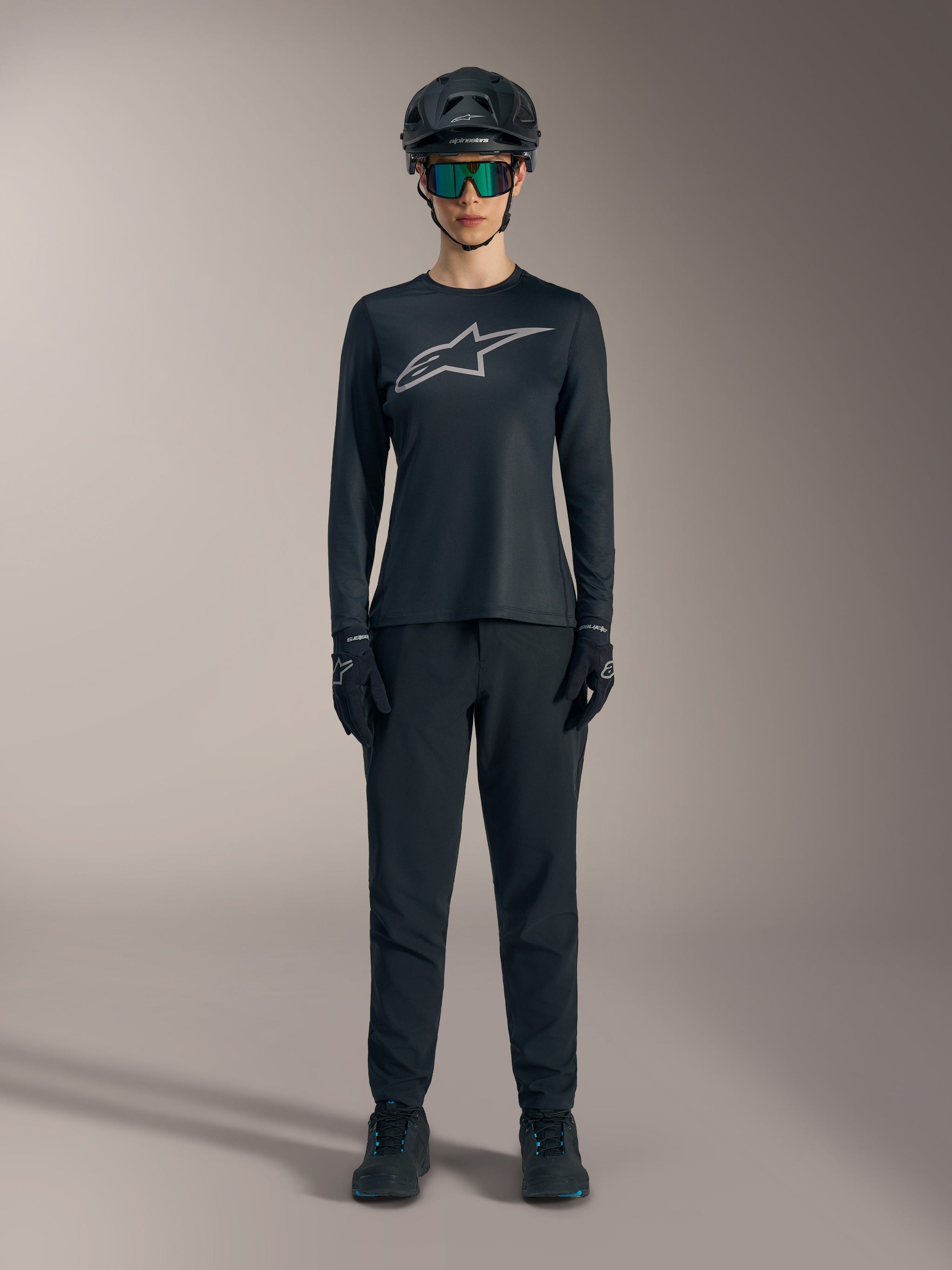 Black Stella A-Dura Ride Long Sleeve Jersey for women with a silver chest logo, designed for mountain bike performance.