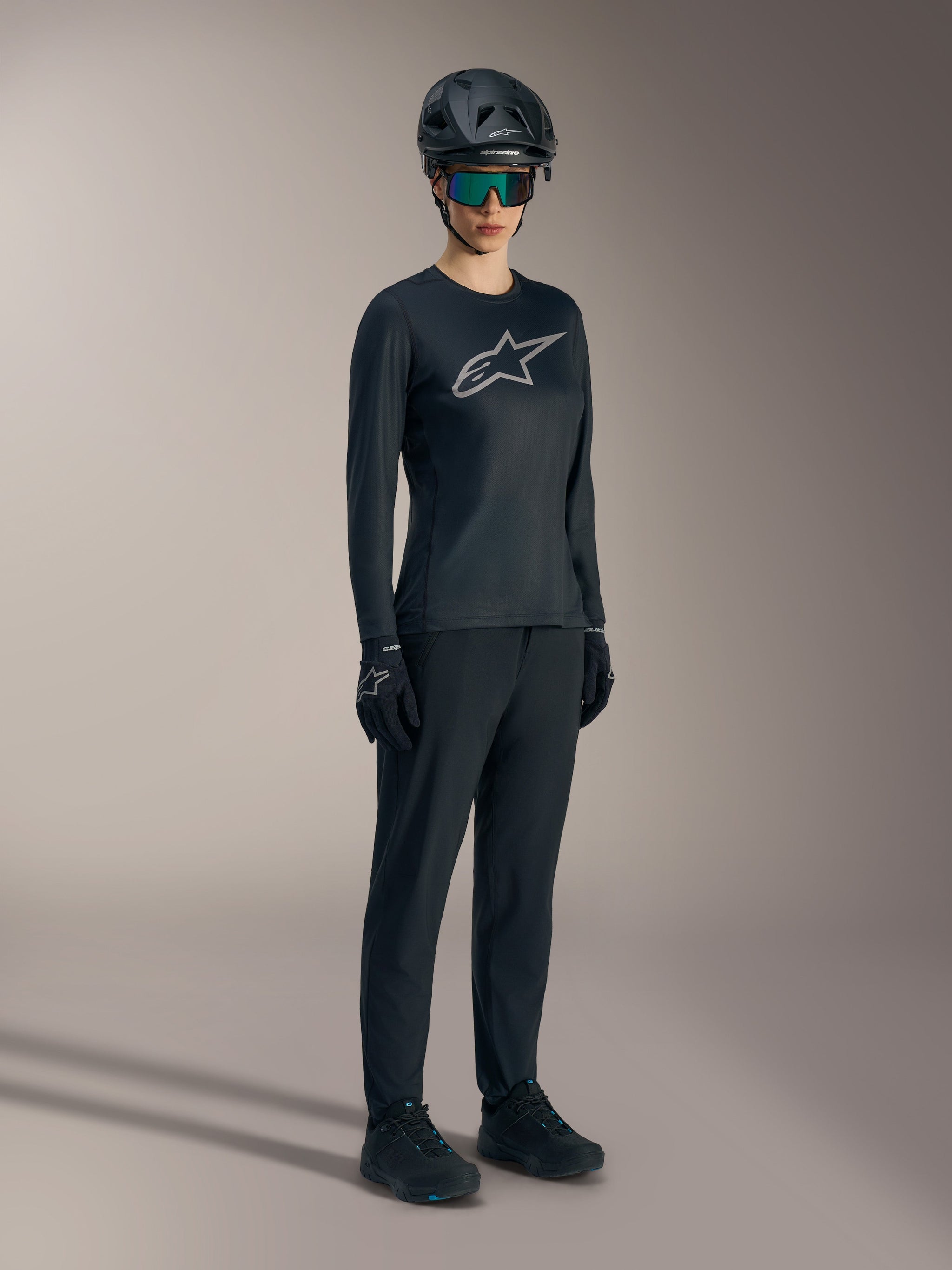 Black Stella A-Dura Ride Long Sleeve Jersey, women's MTB performance top with a prominent silver Astars chest logo.