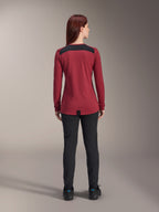 Alpinestars Women Stella A-Dura Dri Astar Long Sleeve Jersey, Burgundy Red with black mesh shoulder panels, technical MTB apparel shown from the back with black pants, drop tail design for cycling coverage