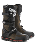 Alpinestars Tech-T Boots, Trials Motorcycle Boots, Brown Oiled leather with black accents, featuring ergonomic shinplates with white Alpinestars logo, triple buckle closure system, and a black sole with a red stripe, rugged off-road footwear