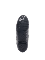 Alpinestars Tech 10 Boots, Motocross Boots, Black, underside view of the sole featuring a textured grip pattern, white star logo at the toe, and a replaceable central sole insert for off-road performance.