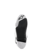 Alpinestars Tech 10 Boots, Motocross Boots, White and Black, bottom view of the sole featuring a textured grip pattern, Alpinestars logo, and a replaceable central insert for off-road racing.