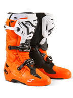 Alpinestars Tech 10 Enduro Boots, Motocross and Enduro Boots, Orange Fluo Black and White, featuring triple buckle closure system, white shin plates with black Alpinestars logo, and rugged dual-compound soles, protective off-road footwear
