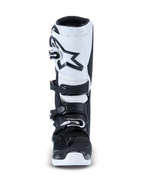 Alpinestars 2026 Tech 7 Enduro Boots, Motocross Boots, Black and White, front view featuring a white shin plate with a black star logo, four-buckle closure system, and durable white outsole