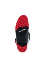 Alpinestars 2026 Tech 7 Enduro Boots, bottom view of the dual compound sole, bright red and black rubber with a specialized tread pattern for off-road grip, featuring the white Alpinestars logo in the center.