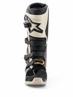 Alpinestars 2026 Tech 7 Enduro Drystar® Boots, Black Dark Gray and Gold, waterproof off-road motorcycle boots, front view featuring multi-buckle closure system with gold accents, TPU shin protection, and star logo design.