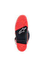 Alpinestars Tech 7 Boots, Outsole view, Bright Fluorescent Red and Black, featuring a textured dual-compound rubber sole with a white Alpinestars star logo and a wear limit indicator