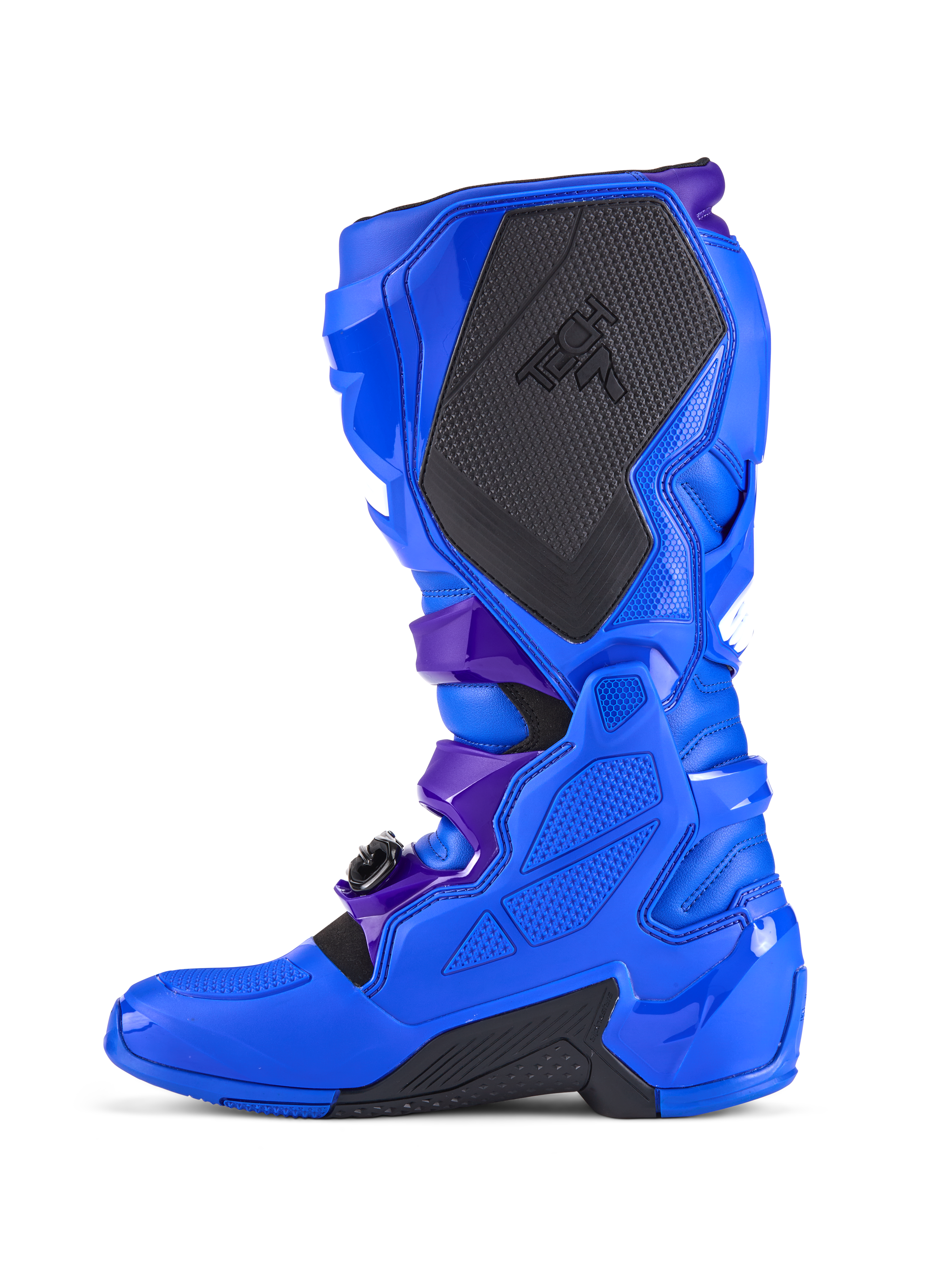 Alpinestars Tech 7 Motocross Boots, Blue, side profile view, featuring reinforced TPU protection, large black textured medial grip panel with TECH 7 branding, dark purple strap accents, and durable black sole sections